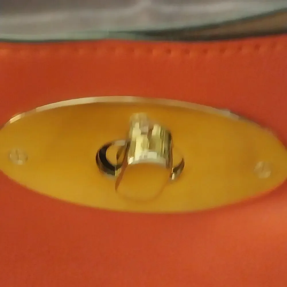 Charming Charlie Orange and Black Studded Satchel